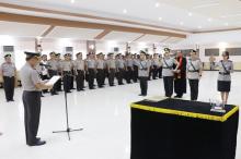 Kabid Humas Polda Sulut dan Kapolres Minahasa Utara Diserahterimakan