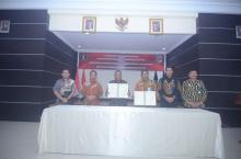 Pemkab Bolmut Teken MoU bersama Kementrian Hukum dan HAM Region Sulut Terkait Pembentukan Produk Hukum Daerah